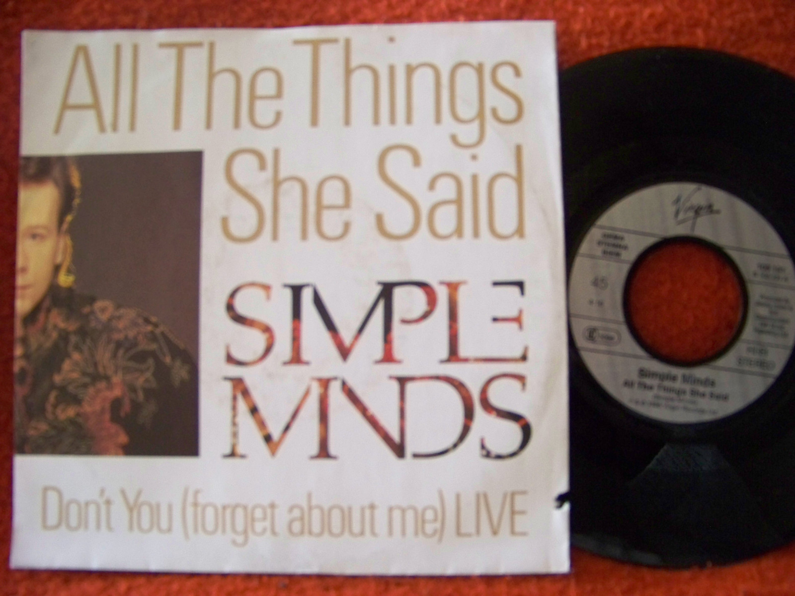 Simple Minds – All the Things She Said / Don’t You Forget About Me (Live) · deutsche 7″-Single, 1986