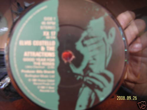 Elvis Costello and the Attractions – Good year for the roses / Your angel steps out of heaven (Single)