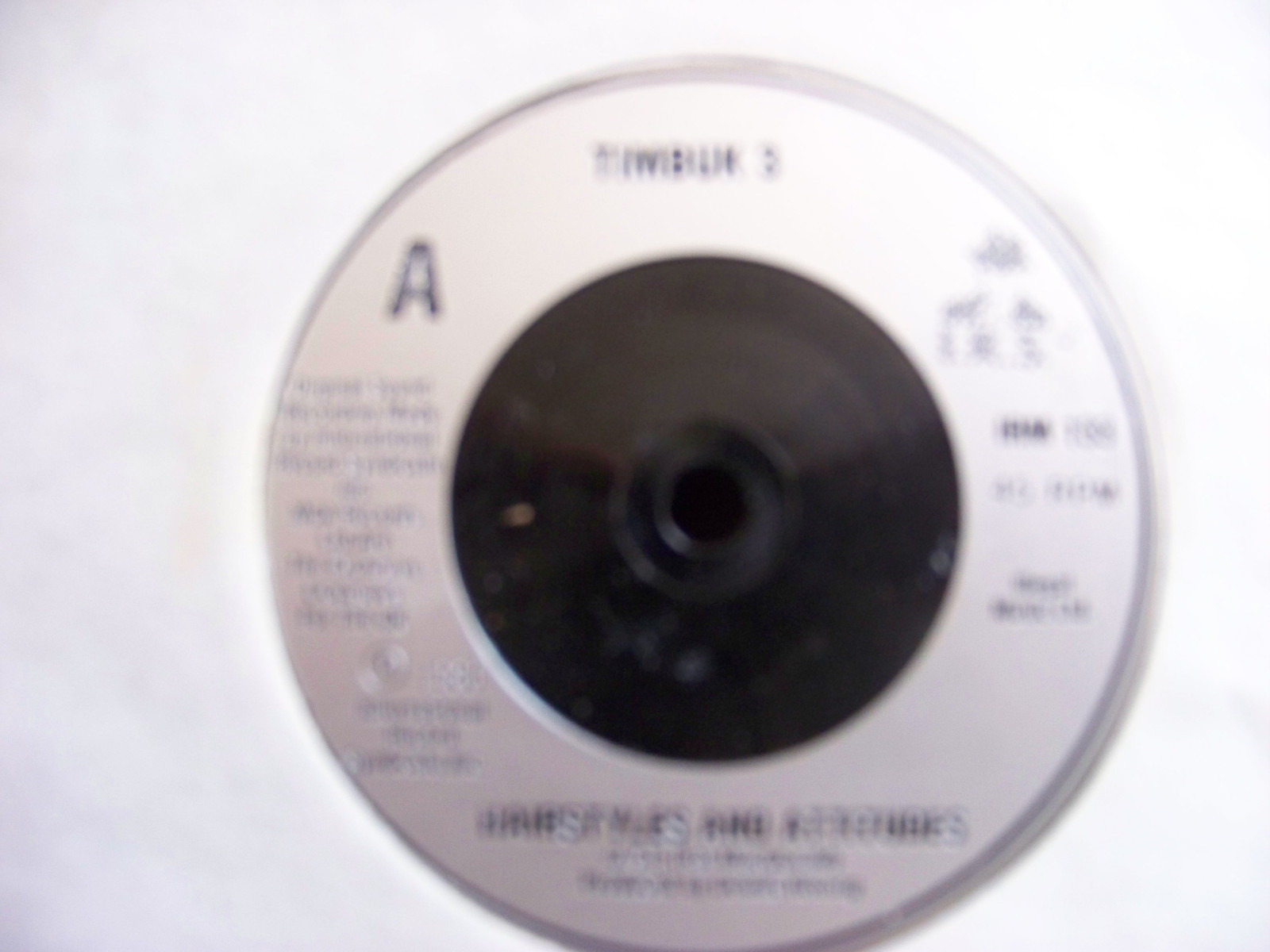 Timbuk 3 – Hairstyles and Attitudes / I Love You in the Strangest Way (UK 45, 1986)