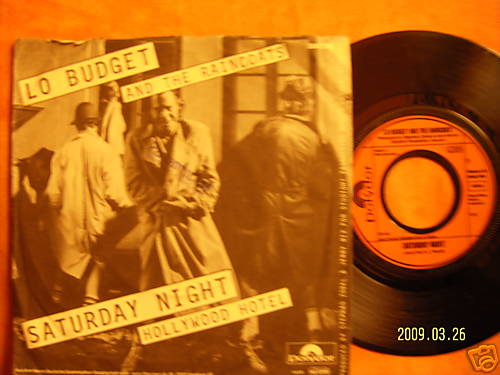 Lo Budget and the Raincoats – Saturday night / Hollywood hotel (Single, 1981)