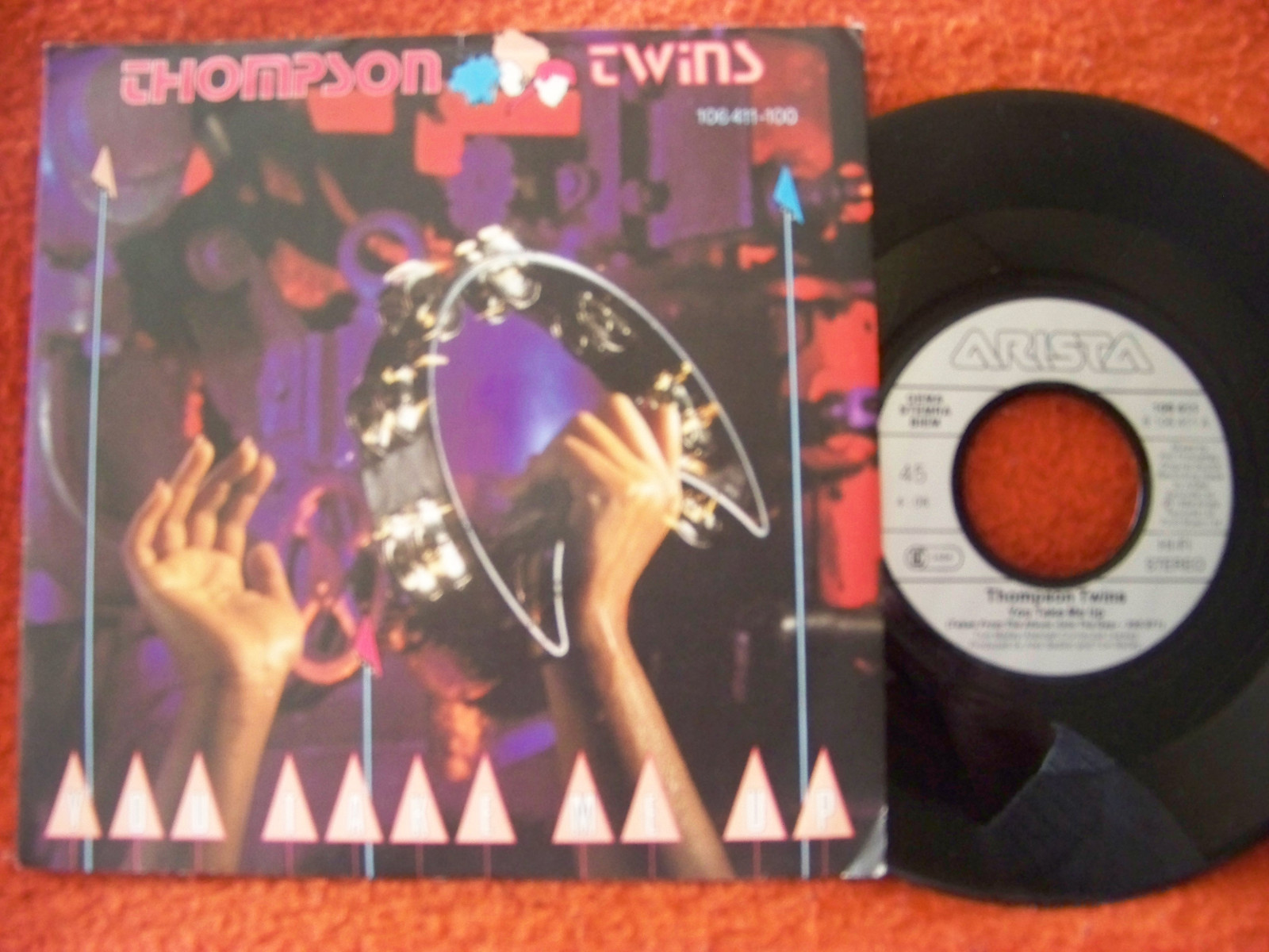 Thompson Twins – You Take Me Up / Passion Planet | Arista 106 411