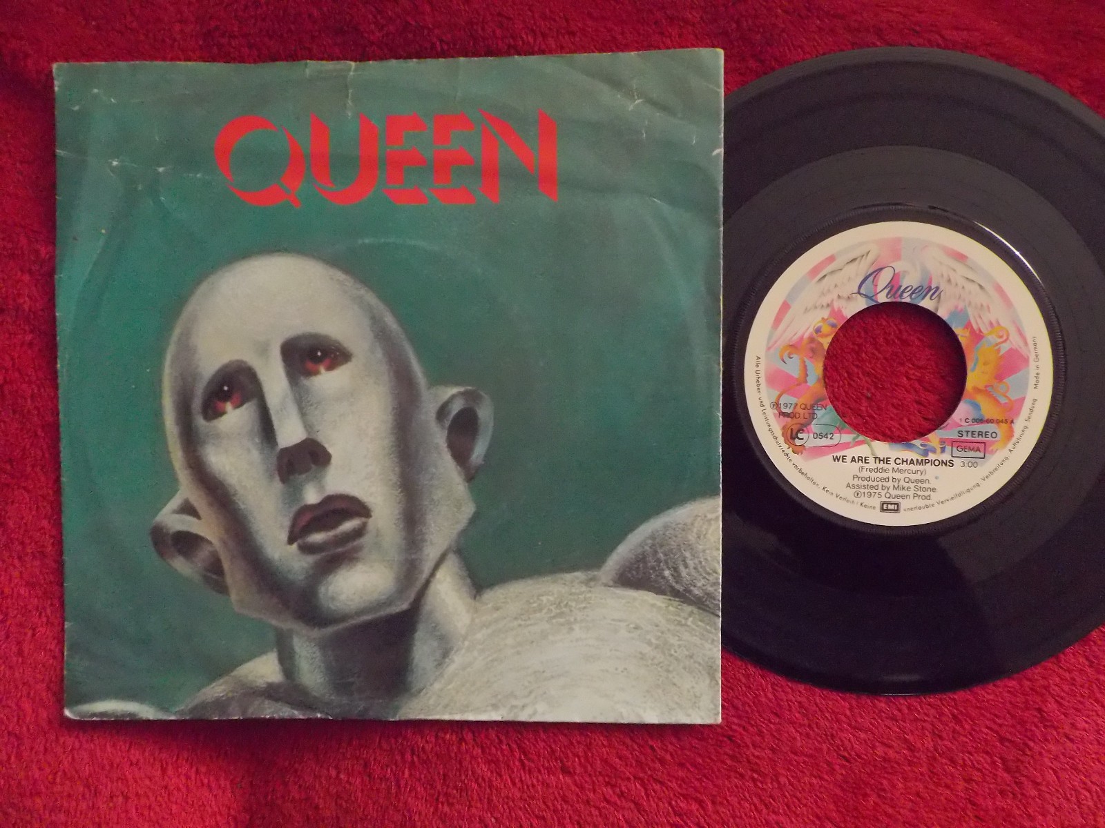 Queen – We Are the Champions / We Will Rock You (7″-Single, 1977)