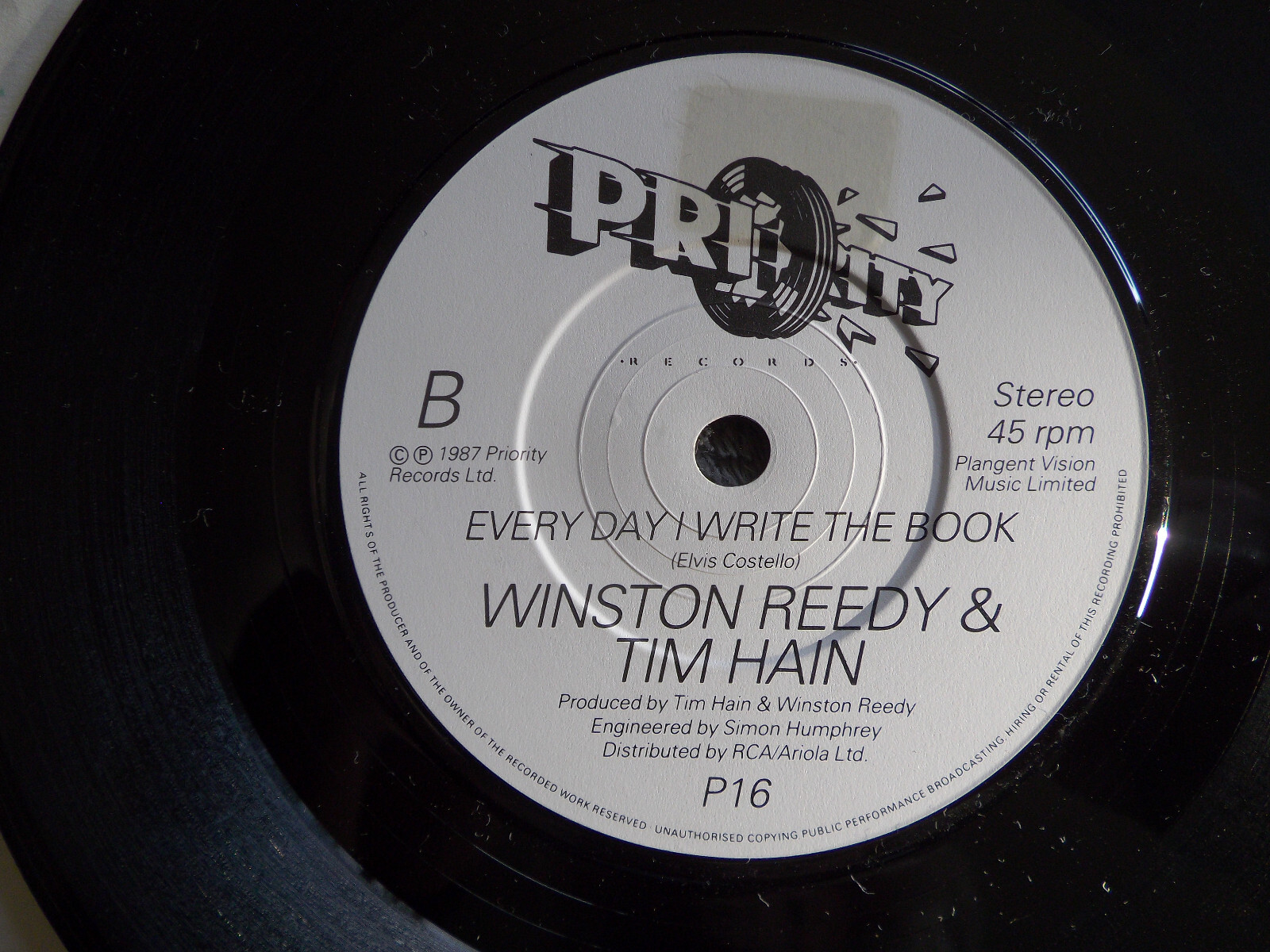 Winston Reedy & Tim Hain – Reggae man / Every day I write the book (Priority Records, P 16, 1987), Bild 2