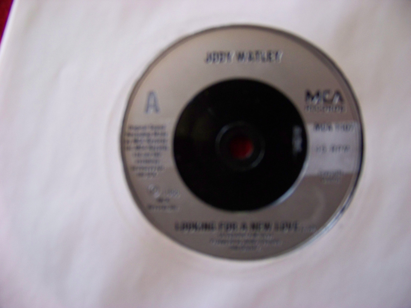 Jody Watley – Looking for a New Love | MCA 1107, UK 1986, 7"-Single
