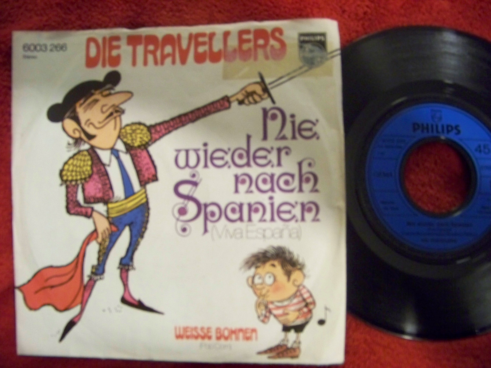 Die Travellers – Nie wieder nach Spanien / Weisse Bohnen (Philips, 45 U/min)
