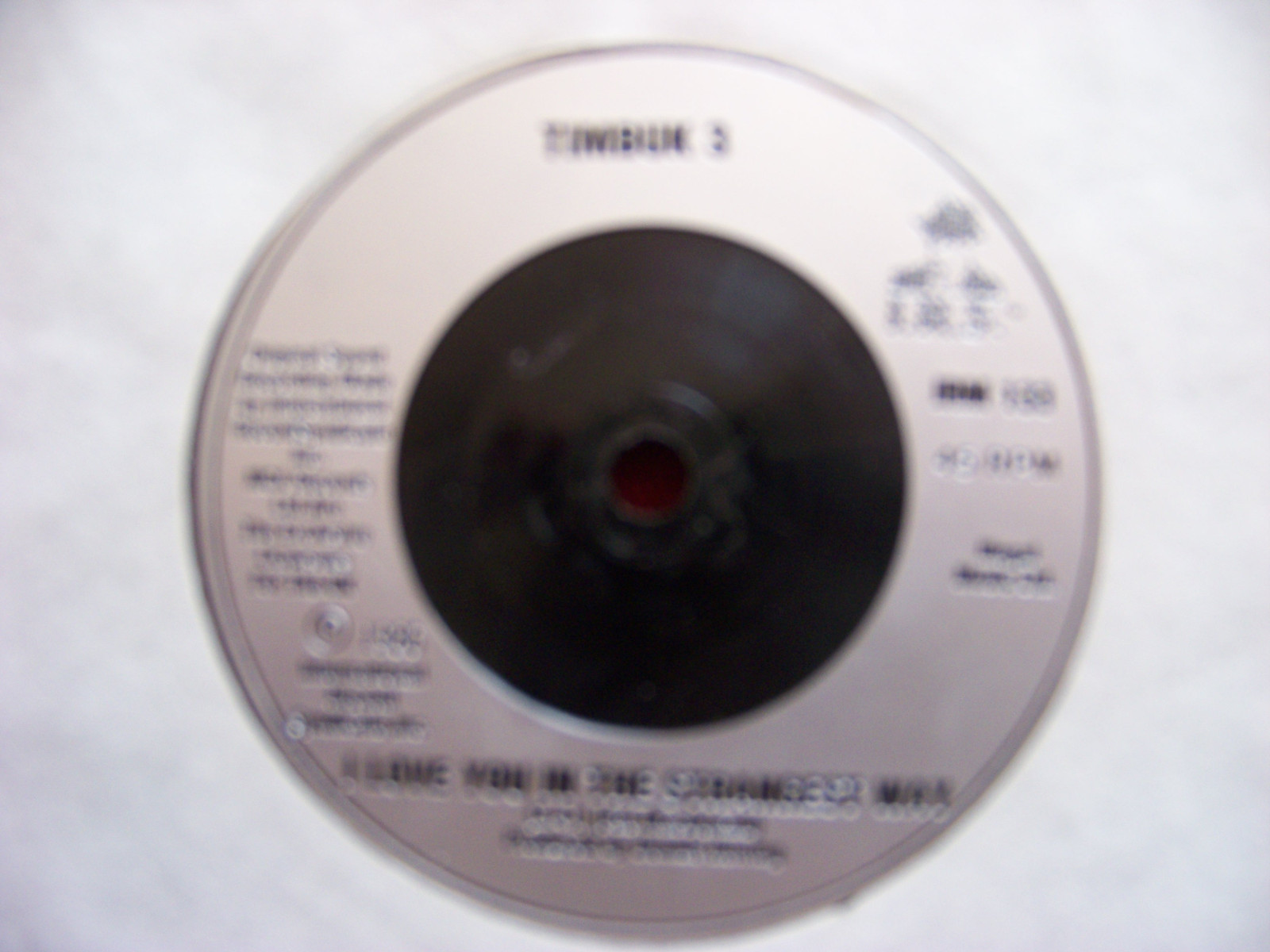 Timbuk 3 – Hairstyles and Attitudes / I Love You in the Strangest Way (UK 45, 1986), Bild 2