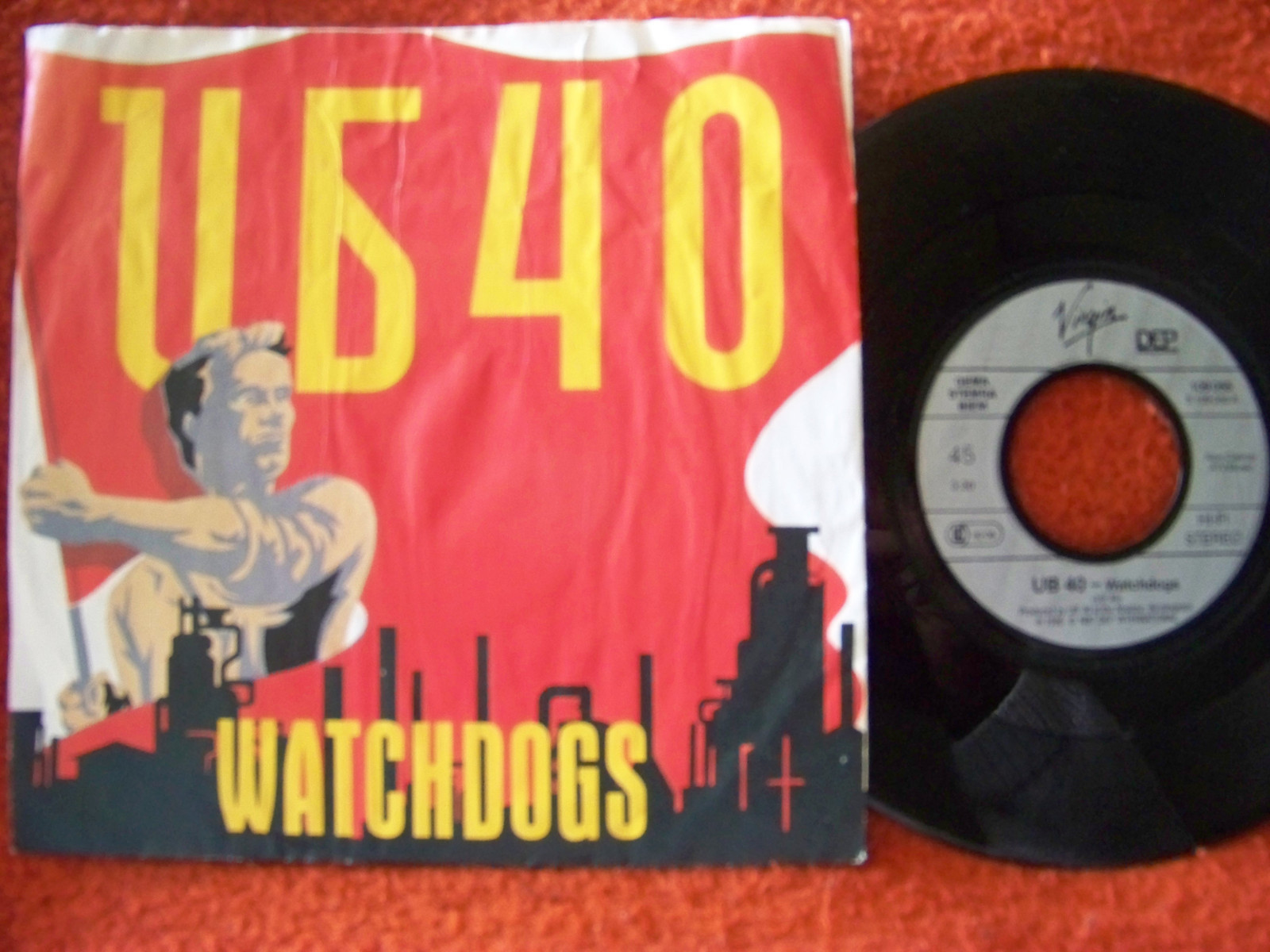 UB40 – Watchdogs / Don´t blame me (live) | Virgin Records, 7″-Single, 1986