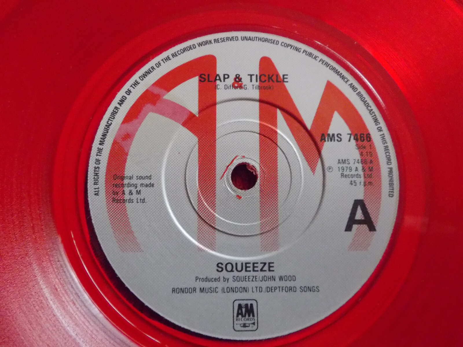 Squeeze – Slap & tickle / All´s well | rote Vinyl-Single, AMS 7466