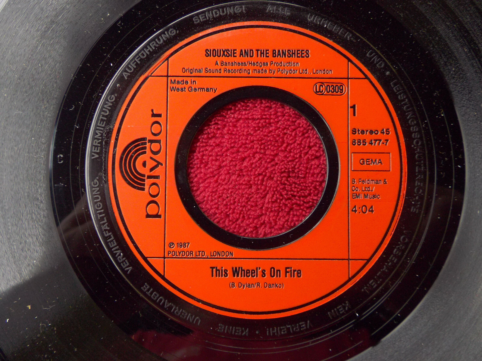 Siouxsie and the Banshees – This wheel´s on fire / Shooting sun (7″-Single, 45 U/min, Polydor, 1987)