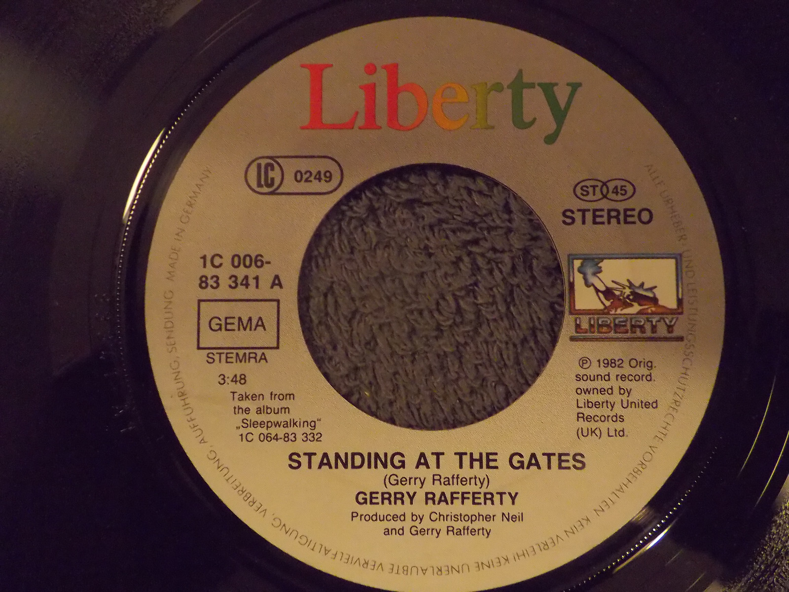 Gerry Rafferty – Standing at the gates / Good intentions (Liberty Records, 7″-Single, 1982)