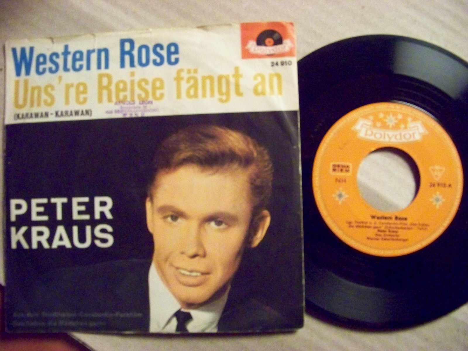Peter Kraus – Western Rose / Uns' re Reise fängt an (Polydor 24 910)